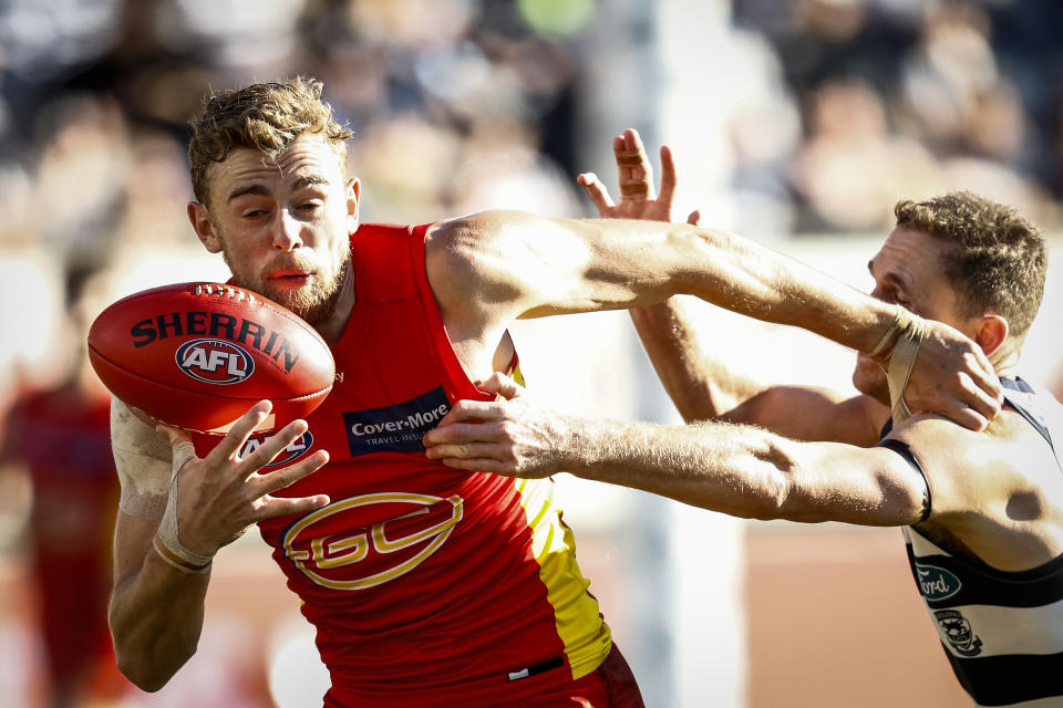 Seen here, talented midfielder Hugh Greenwood in action for the Gold Coast Suns.