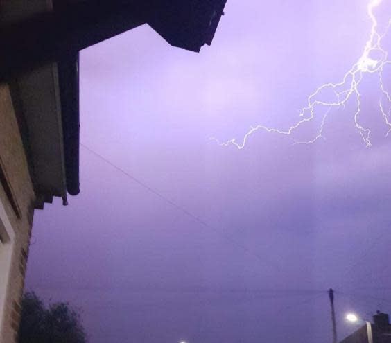 Lightning seen from a house in Canterbury as torrential rain and a spectacular electrical storm lashed parts of the UK on Tuesday night (Wendy Howard / PA)