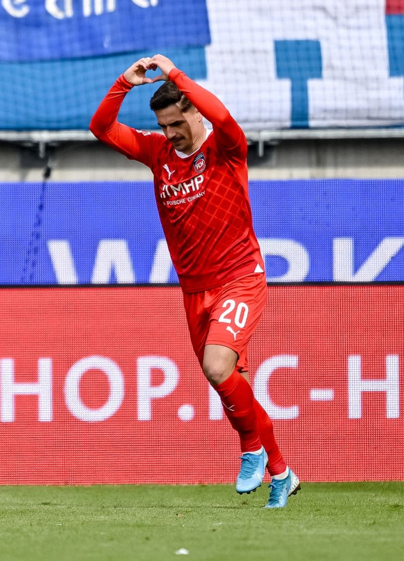 Heidenheim's Nikola Dovedan celebrates scoring his side's first goal during the German Bundesliga soccer match between 1. FC Heidenheim and RB Leipzig at Voith-Arena. Harry Langer/dpa