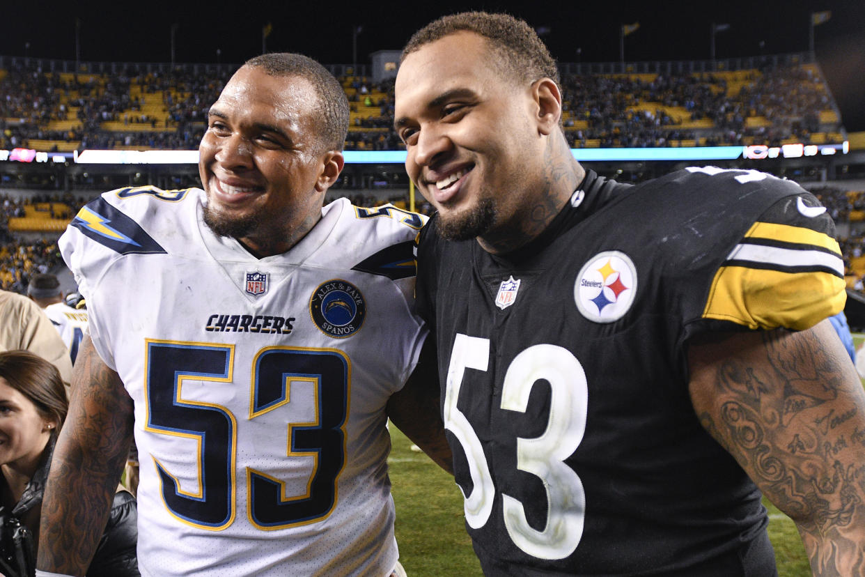 Mike Pouncey and Maurkice Pouncey after a game. 