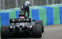 Mercedes driver Valtteri Bottas of Finland leaves his car after he crashed during the Hungarian Formula One Grand Prix at the Hungaroring racetrack in Mogyorod, Hungary, Sunday, Aug. 1, 2021. (AP Photo/Darko Bandic)