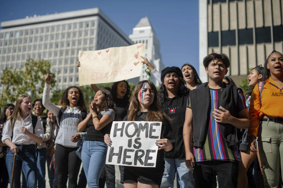 Students walk out of school in Los Angeles to defend the Deferred Action for Childhood Arrivals program, while the U.S. Supreme Court considers the fate of the Obama-era immigration program being challenged by the Trump administration on Tuesday, Nov. 12, 2019. (Sarah Reingewirtz/The Orange County Register/SCNG via AP)