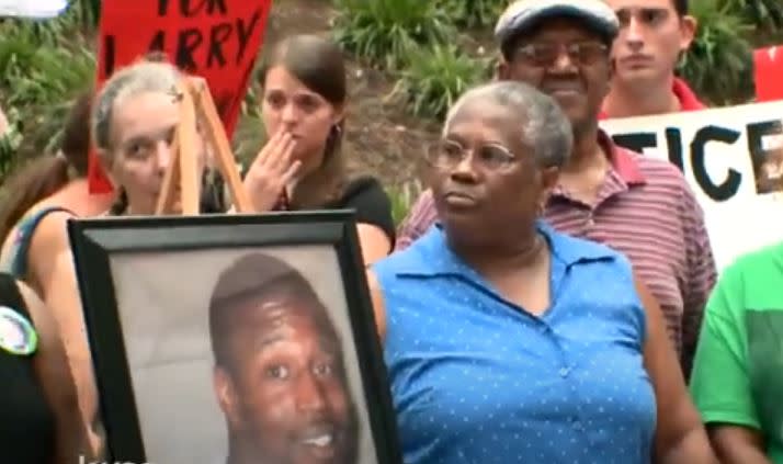 The family of Larry Jackson Jr. and some supporters gathered outside the courthouse, while the grand jury considered indicting Detective Charles Kleinert (KXAN file photo)
