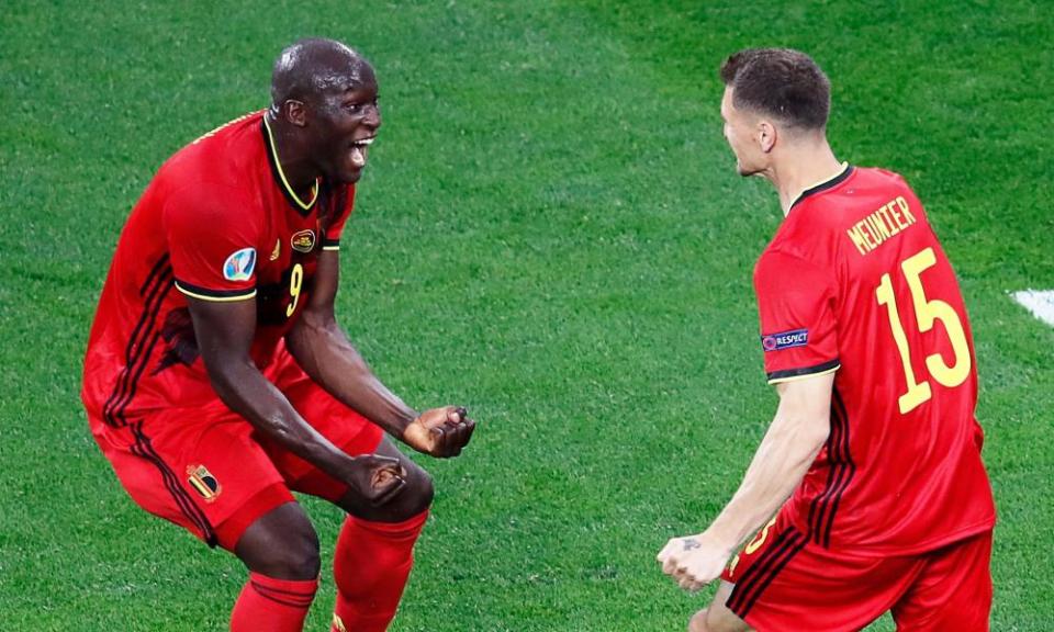 Thomas Meunier celebrates with Lukaku after scoring Belgium’s second goal