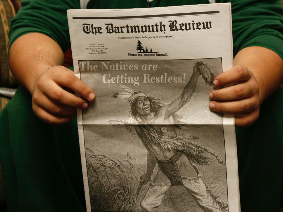 Dartmouth College Native American student Elliott Dial, from Sumter, S.C., holds the most recent edition of The Dartmouth Review in Hanover, N.H., Wednesday, Nov. 29, 2006.