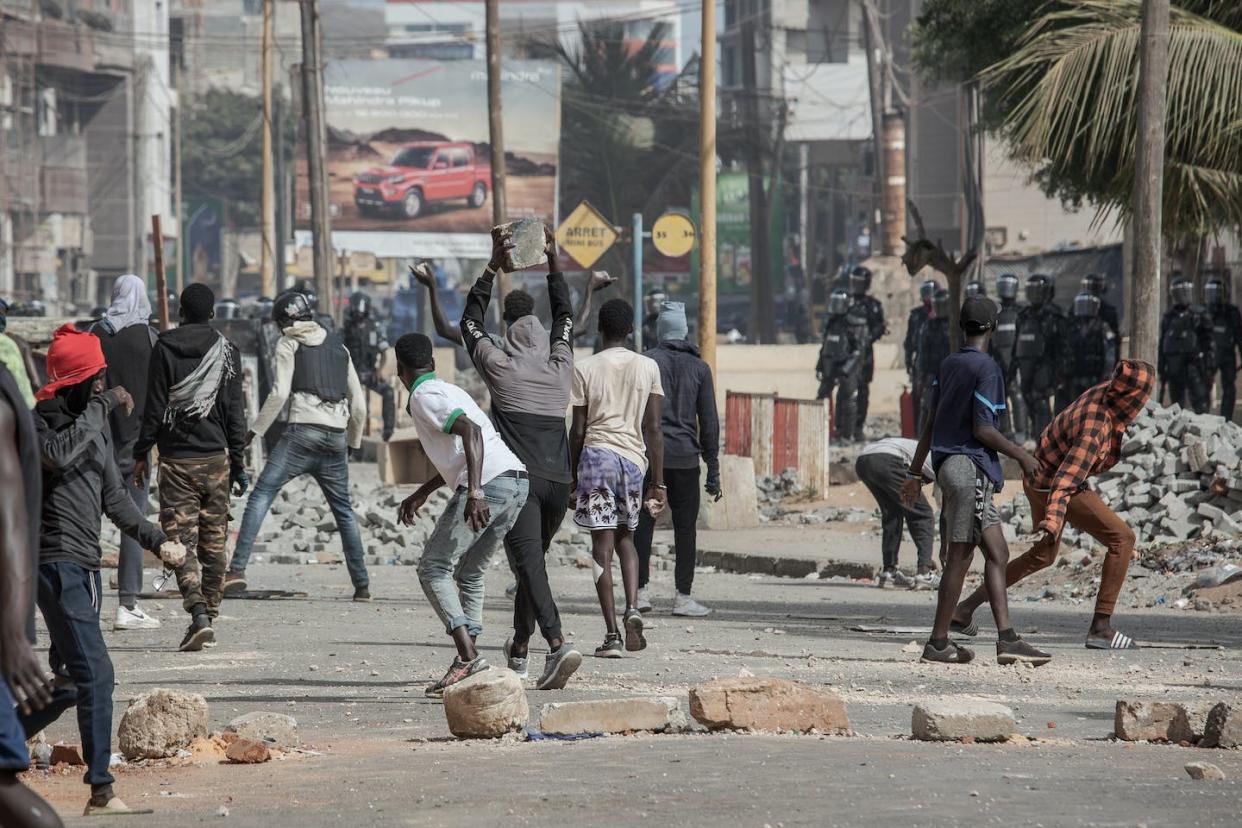 Clashes erupted in Senegal following the sentencing of opposition leader <span class="caas-xray-inline-tooltip"><span class="caas-xray-inline caas-xray-entity caas-xray-pill rapid-nonanchor-lt" data-entity-id="Ousmane_Sonko" data-ylk="cid:Ousmane_Sonko;pos:1;elmt:wiki;sec:pill-inline-entity;elm:pill-inline-text;itc:1;cat:Politician;" tabindex="0" aria-haspopup="dialog"><a href="https://search.yahoo.com/search?p=Ousmane%20Sonko" data-i13n="cid:Ousmane_Sonko;pos:1;elmt:wiki;sec:pill-inline-entity;elm:pill-inline-text;itc:1;cat:Politician;" tabindex="-1" data-ylk="slk:Ousmane Sonko;cid:Ousmane_Sonko;pos:1;elmt:wiki;sec:pill-inline-entity;elm:pill-inline-text;itc:1;cat:Politician;" class="link ">Ousmane Sonko</a></span></span> to two years in prison for "corrupting the youth" in June 2023. Annika Hammerschlag/Anadolu Agency via Getty Images