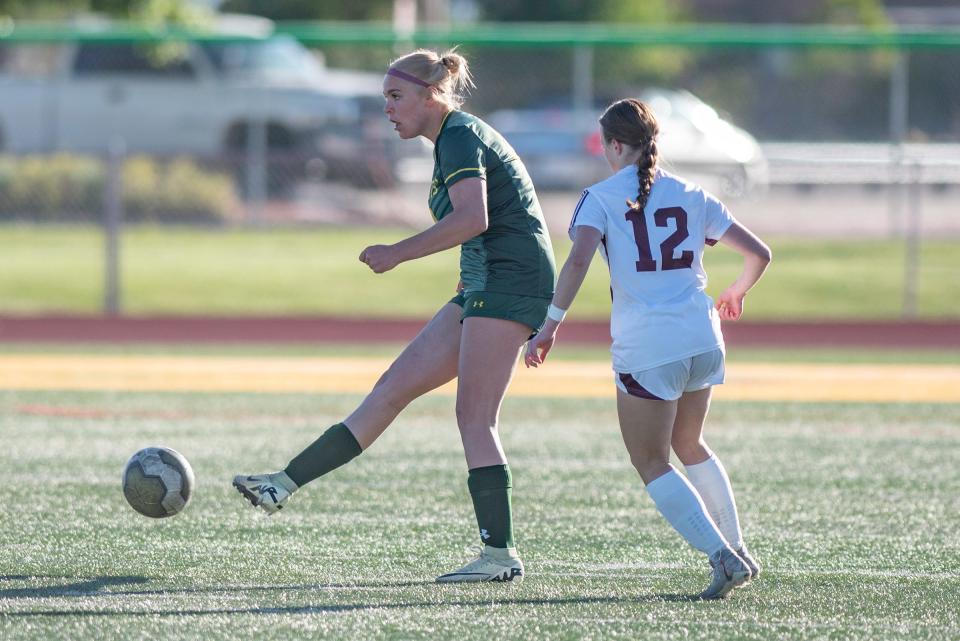 Pueblo County's Rylee Stupnik makes a pass during the first round of the CHSAA girls soccer state championship tournament against Cheyenne Mountain on Wednesday, May 8, 2024.