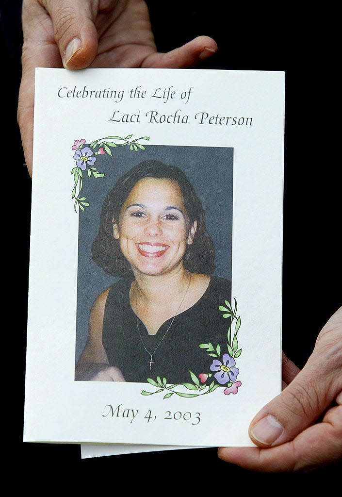 The program for the memorial service for Laci Peterson and her unborn son Connor shows a smiling image of Lacy on May 4, 2003, in Modesto, California.