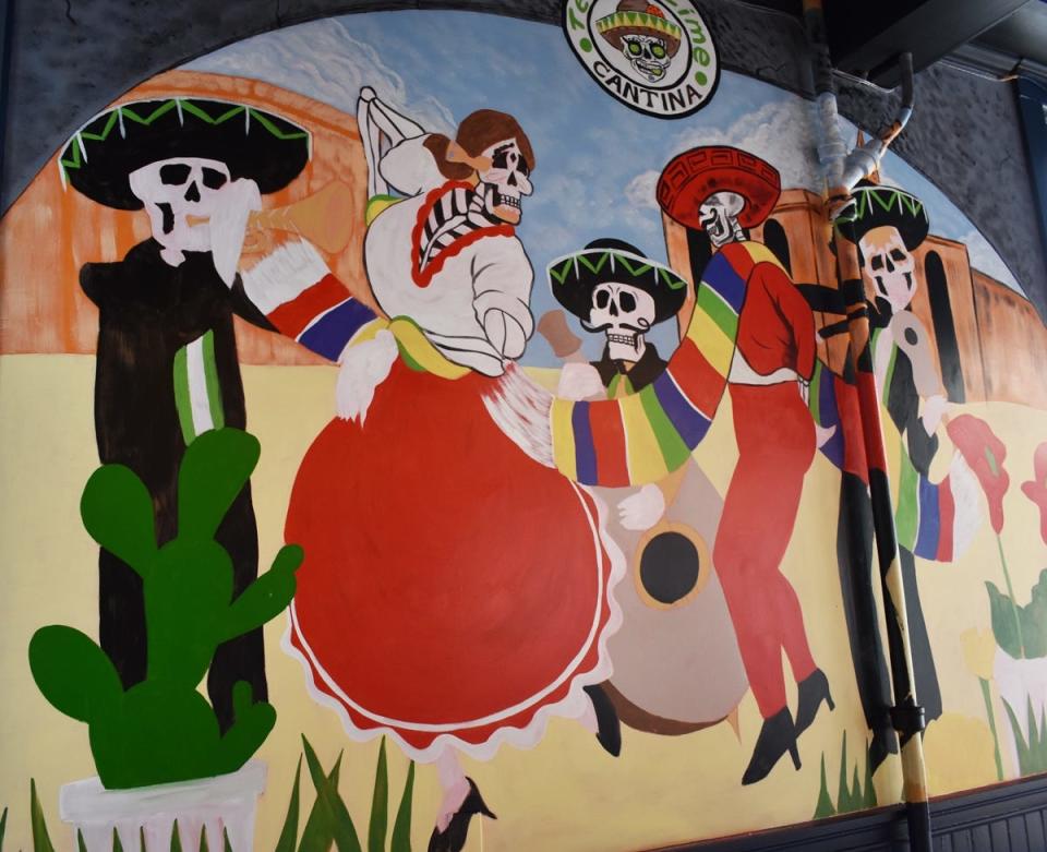 A mural on the Purchase Street side of the interior of Tequila Lime Cantina.