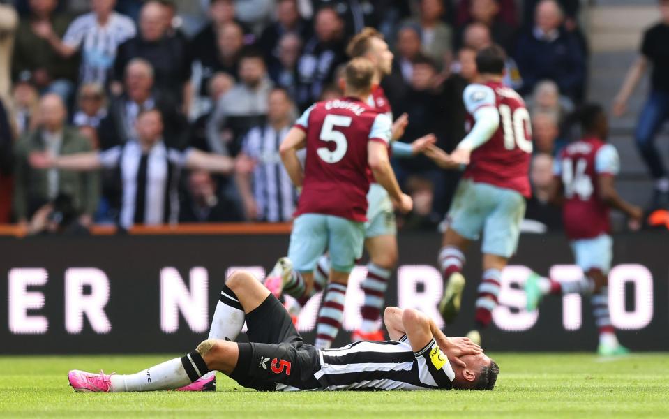 Fabian Schaer of Newcastle United goes down with an injury