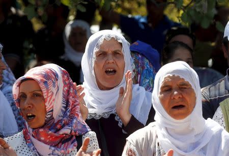 Turkish Kurdish women shout slogans during a peace day gathering near the Kurdish-dominated southeastern town of Lice in Diyarbakir province, Turkey, September 1, 2015. REUTERS/Osman Orsal