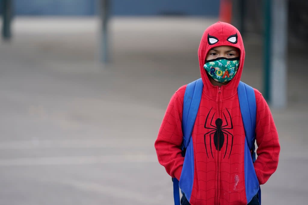 File: A student wears a mask while waiting for class to start amid the Covid pandemic at Washington Elementary School on Wednesday (AP)