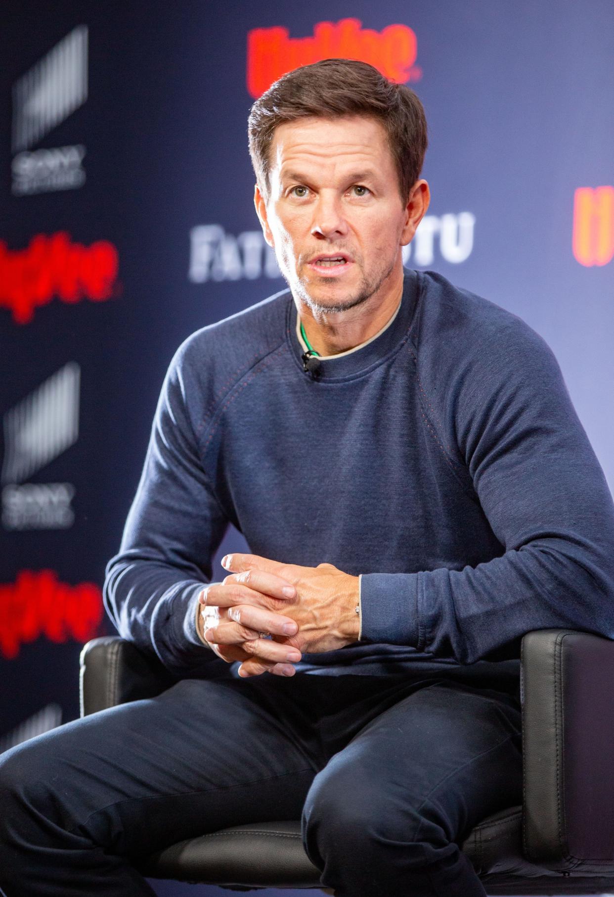 Actor Mark Wahlberg takes questions before the premiere of his new movie "Father Stu" at Hy-Vee's Ron Pearson Center in West Des Moines in 2022.