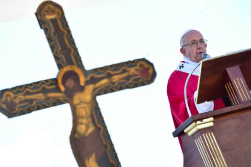 Pope Francis called on mobsters to convert to a crime-free life, at an open-air mass in Palermo