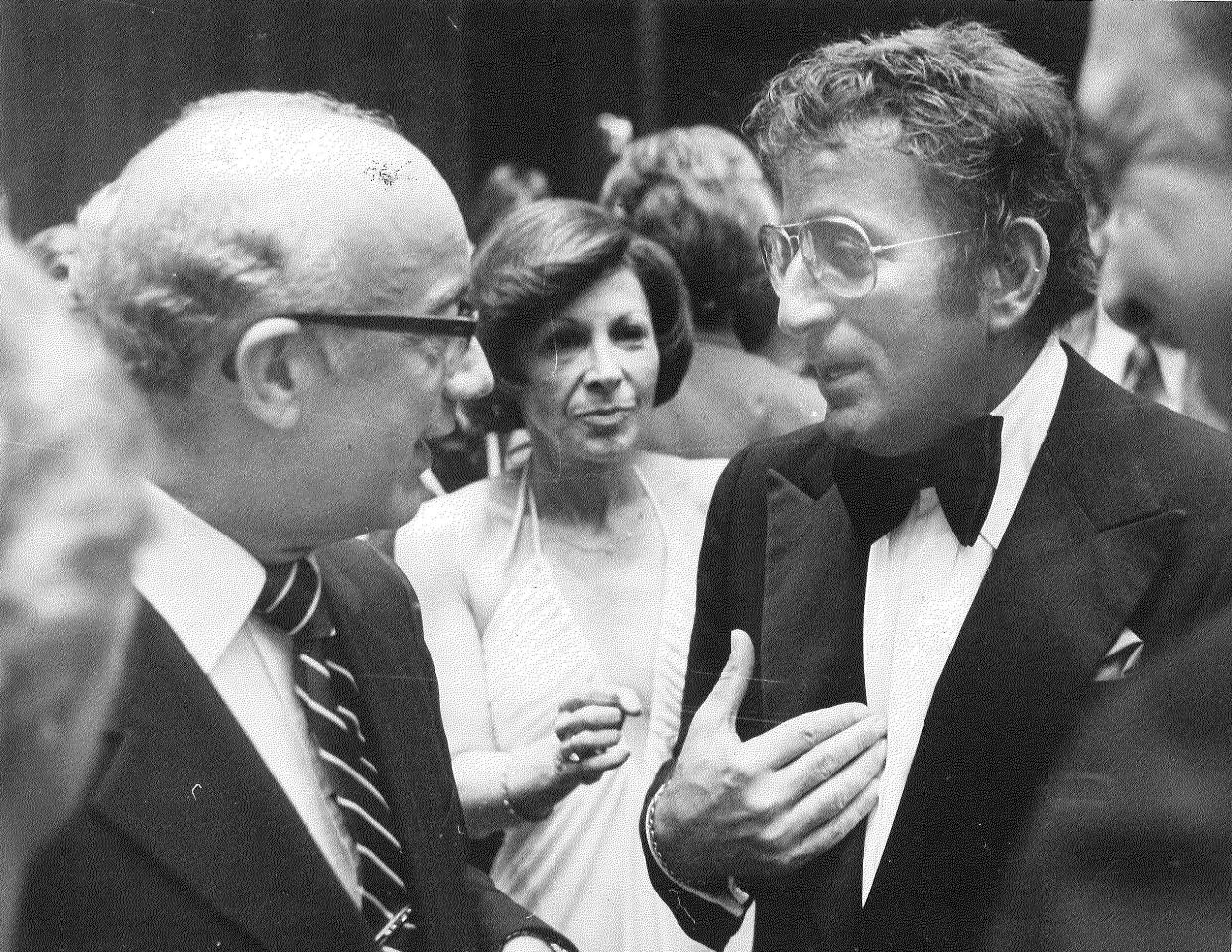 University of Akron President Dominic Guzzetta, left, and Tony Bennett, right, talk after Bennett's 1976 performance at E.J. Thomas Hall.