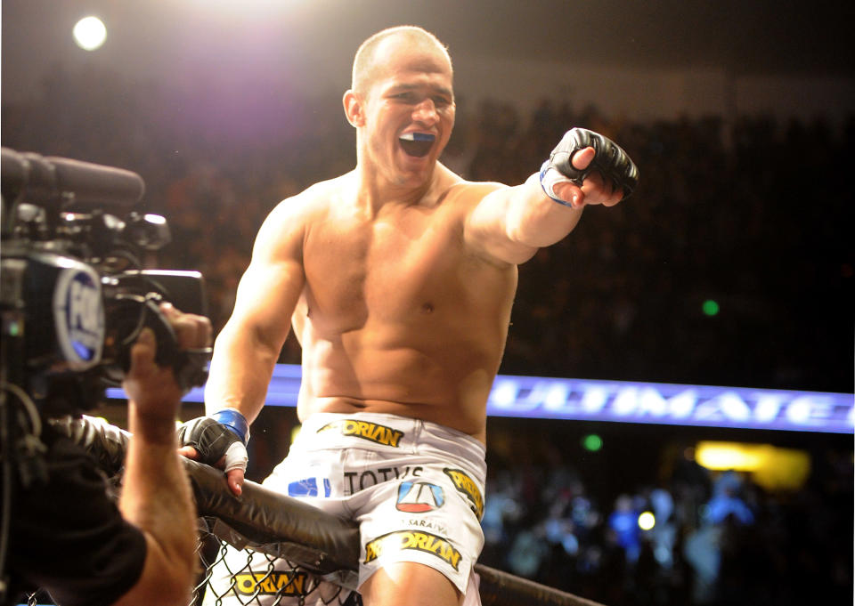 Junior dos Santos celebrates after winning the UFC heavyweight title by knocking out Cain Velasquez on November 12, 2011 in Anaheim, California. (Photo by Jason Merritt/Getty Images)