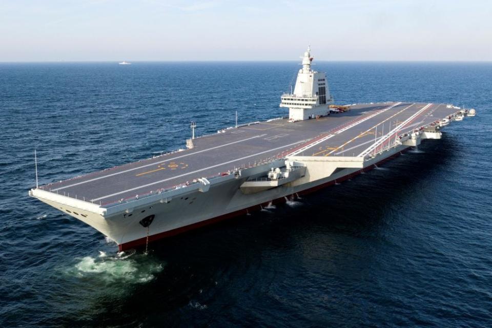 An aerial drone photo taken on May 1, 2024 shows China's third aircraft carrier, the Fujian, during its maiden sea trials.