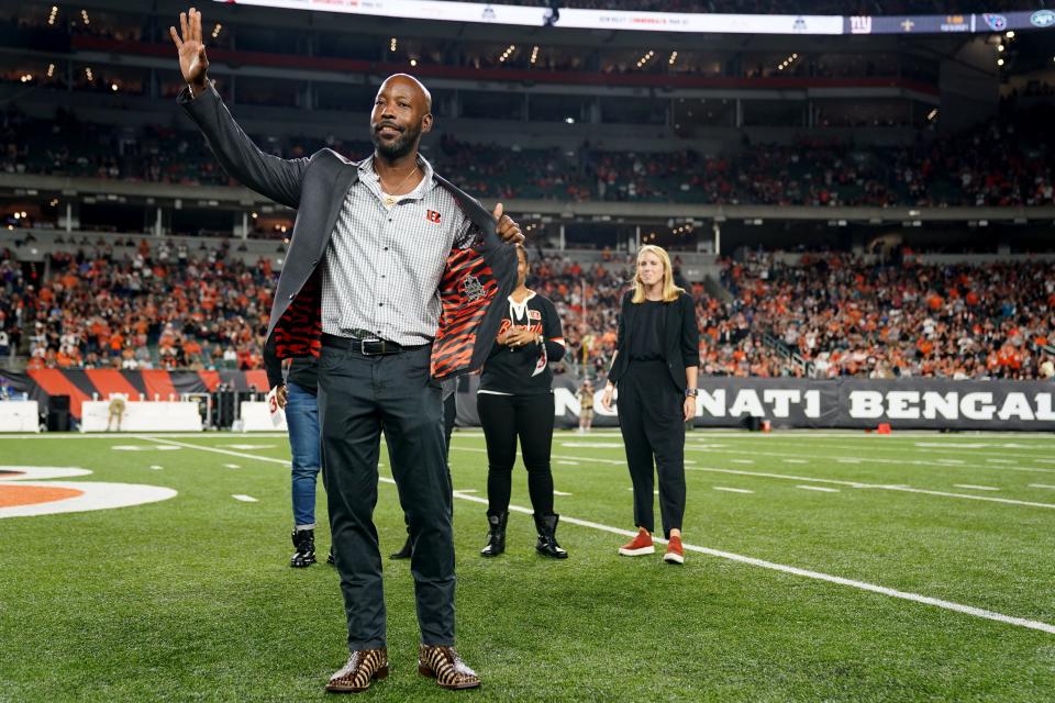 Former Cincinnati Bengals cornerback Ken Riley's son, Ken Riley II, waves to the crowds after receiving a Ring of Honor jacket on his father's behalf at halftime during a Week 4 NFL football game between the Jacksonville Jaguars and the Cincinnati Bengals, Thursday, Sept. 30, 2021, at Paul Brown Stadium in Cincinnati.