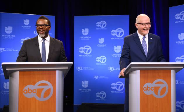 Chicago mayoral candidates Brandon Johnson (left) and Paul Vallas wait for the start of a debate at ABC7 studios in downtown Chicago, on March 16.