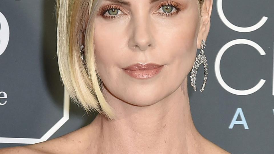 Charlize Theron asymmetrical blonde bob hairstyle