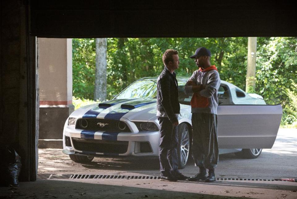 This image released by DreamWorks II shows Aaron Paul, left, and Scott Mescudi in a scene from “Need for Speed.” (AP Photo/DreamWorks II, Melinda Sue Gordon)