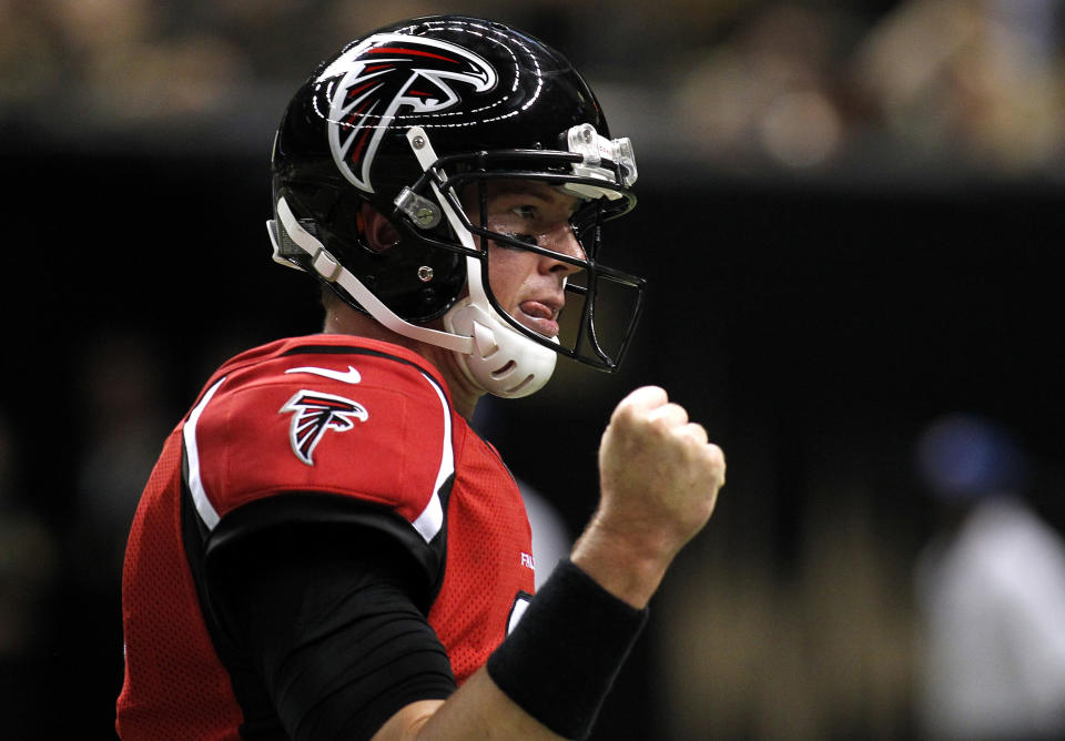 Atlanta Falcons quarterback Matt Ryan celebrates after throwing a touchdown during the first half of their NFL football game against the New Orleans Saints in New Orleans, Louisiana September 8, 2013. REUTERS/Jonathan Bachman (UNITED STATES - Tags: SPORT FOOTBALL)