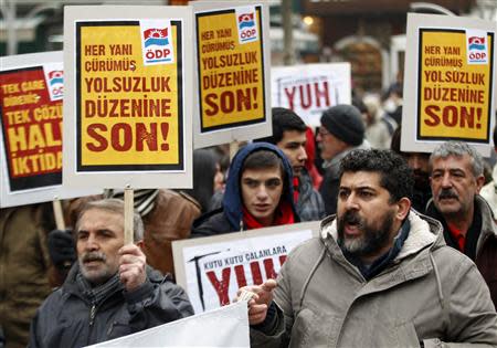 Leftist protesters demonstrate against Turkey's ruling Ak Party (AKP) and Prime Minister Tayyip Erdogan in Ankara December 21, 2013. REUTERS/Umit Bektas