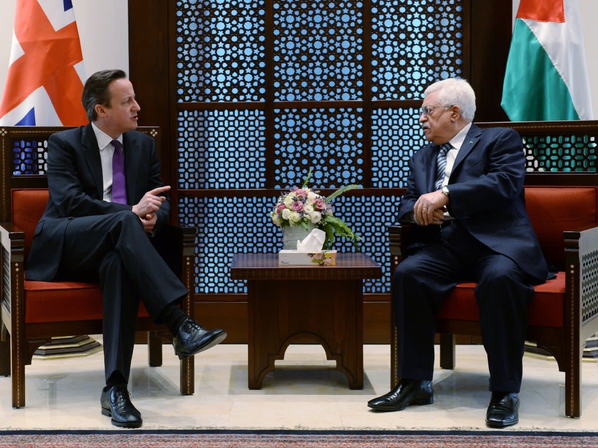 David Cameron talks with Palestinian president Mahmoud Abbas during trip to Middle East in 2014 (PA)