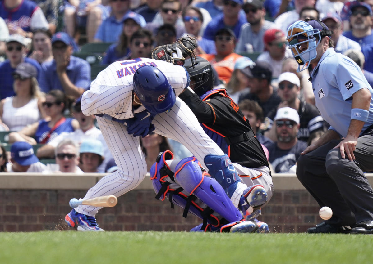 Chicago Cubs catcher Tucker Barnhart (18) pitches against the New York Mets  during the eighth inning of a baseball game, Monday, Aug. 7, 2023, in New  York. The Mets defeated the Cubs