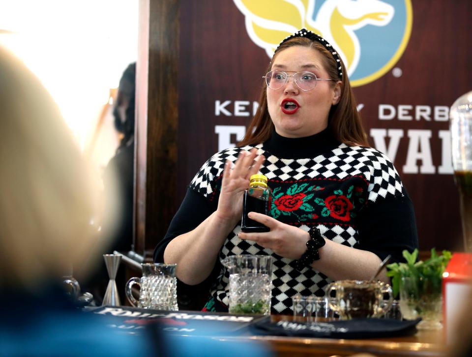 SC Baker from Bar Expo creates her mint julep called Spend a Buck at the Kentucky Derby Festival Four Roses Mint Julep Contest on Thursday, March 16, 2023, at the Mellwood Arts Center.