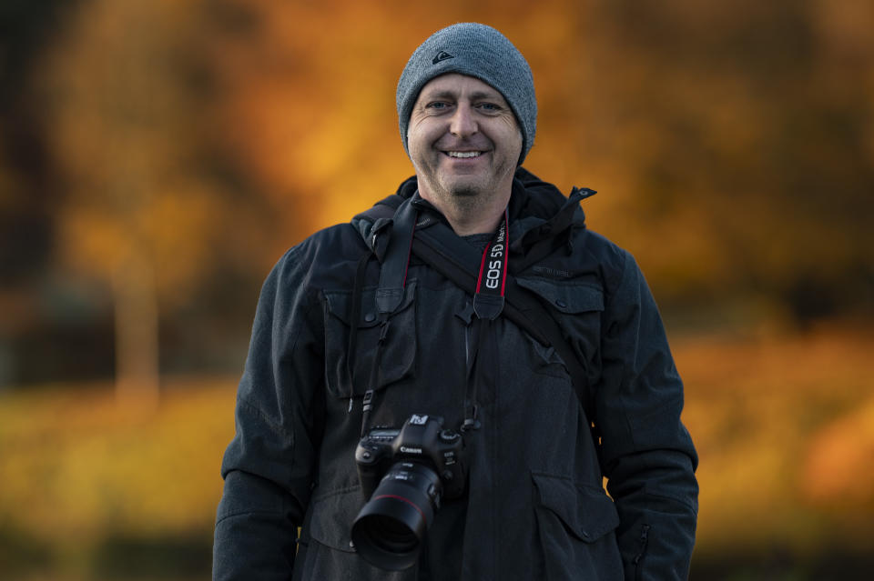 Portrait with autumn colors in the background