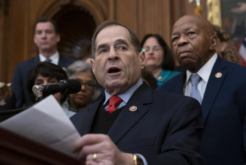 In this file photo from Friday, Jan. 4, 2019, Rep. Jerrold Nadler, D-N.Y., chairman of the House Judiciary Committee, joined at right by Rep. Elijah Cummings, D-Md., chairman of the House Committee on Oversight and Reform, speaks to House Democrats, now in the majority, during an event at the Capitol in Washington. Nadler says that he believes President Donald Trump obstructed justice and that House Democrats are requesting documents from scores of people from Trump's administration, family and business as part of the Russia probe. Nadler says the House Judiciary Committee on Monday is requesting documents from the Justice Department, Donald Trump Jr. and Trump Organization executive Alan Weisselberg. (AP Photo/J. Scott Applewhite, file)
