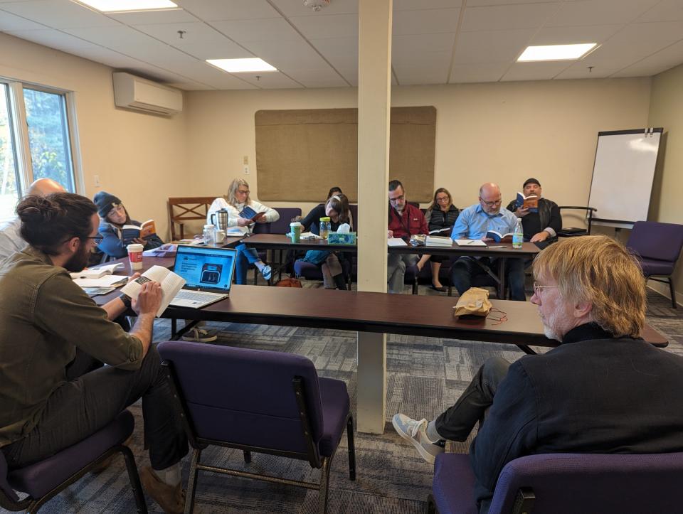 Trey Anastasio of Phish (foreground right) joins a meeting at the Divided Sky Residential Recovery Program in Ludlow.