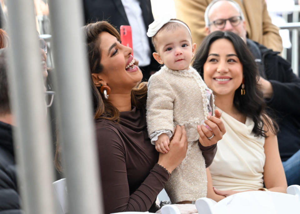 Priyanka Chopra Jonas holds Malti Marie Chopra Jonas at the star ceremony in January 2023