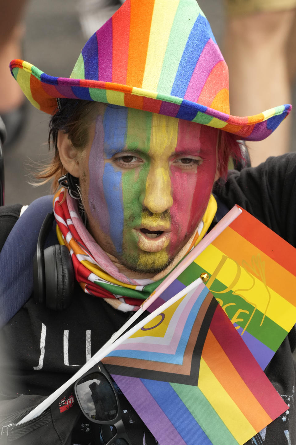 A man takes part in the yearly pride parade, known as the Equality Parade, in Warsaw, Poland, on Saturday, June 17, 2023. (AP Photo/Czarek Sokolowski)