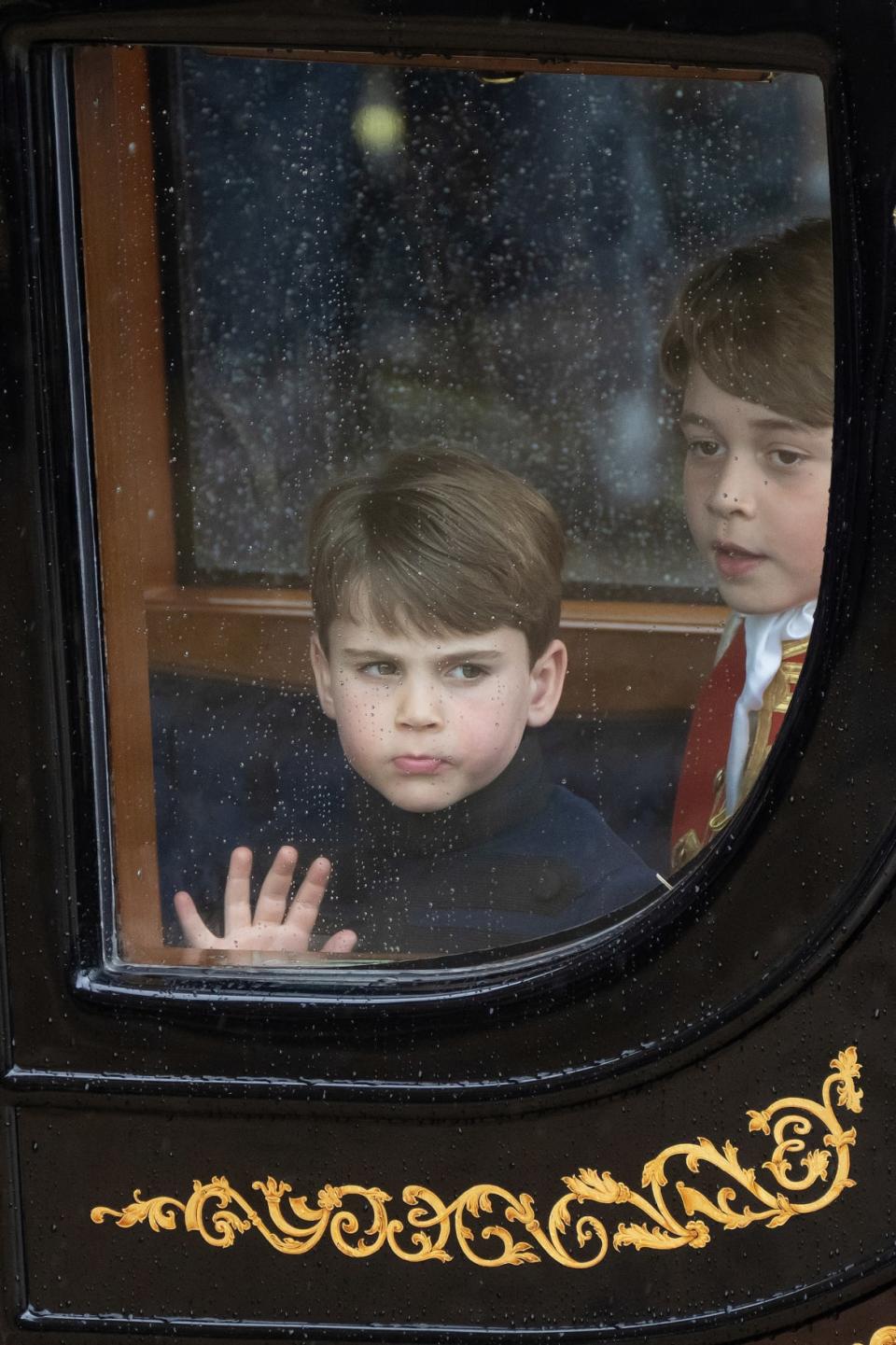 <div class="inline-image__caption"><p>Prince Louis of Wales and Prince George of Wales travel back to Buckingham Palace from Westminster Abbey, following Britain's King Charles' coronation ceremony, in London, Britain May 6, 2023.</p></div> <div class="inline-image__credit">Jack Boskett/Pool via REUTERS</div>