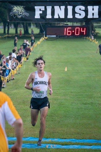 Buchholz runner Emerson Miller wins the boys varsity race at the Buchholz Bobcat Classic at Santa Fe College in Gainesville, Sept. 10, 2022.