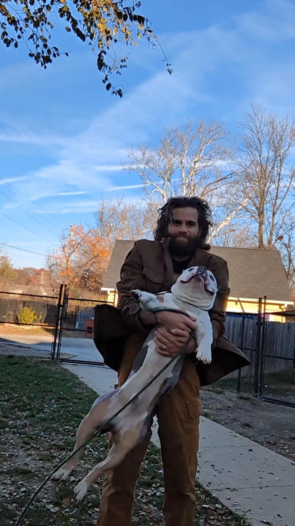 Cameron Shoppach, an Indiana man known as the 'Dangler in Chief.' He dangles dogs looking for forever homes, hoping to help them get adopted.