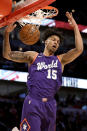 World forward Brandon Clarke, of the Memphis Grizzlies, dunks against the U.S. during the first half of the NBA Rising Stars basketball game in Chicago, Friday, Feb. 14, 2020. (AP Photo/Nam Y. Huh)