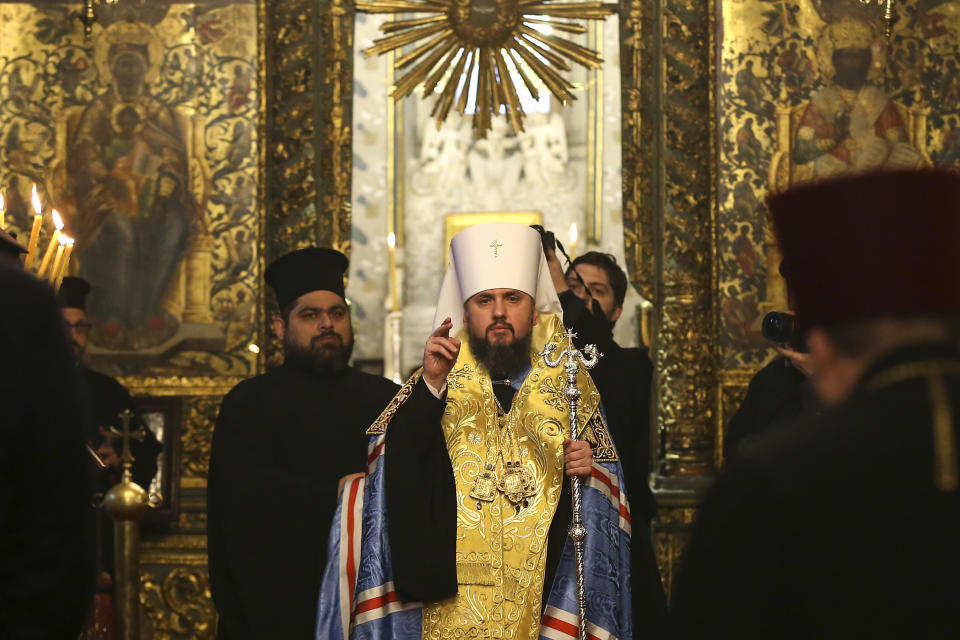Metropolitan Epiphanius, the head of the independent Ukrainian Orthodox Church, center, arrives to attend a meeting to sign "Tomos" decree of autocephaly for Ukrainian church at the Patriarchal Church of St. George in Istanbul, Turkey, Saturday, Jan. 5, 2019. (AP Photo/Emrah Gurel)
