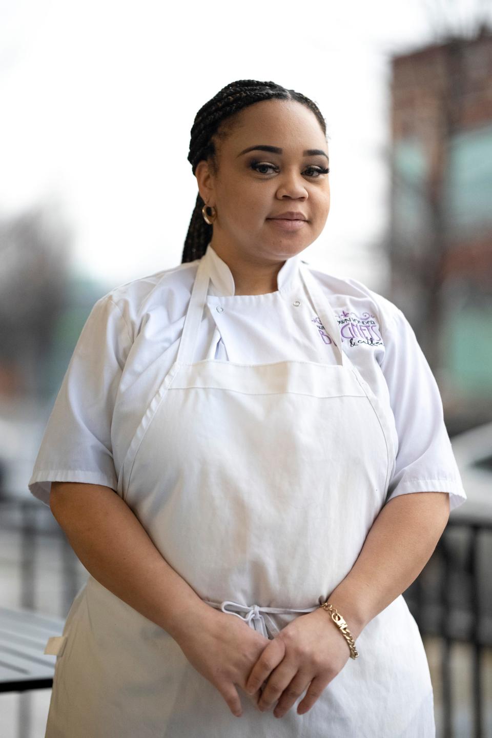 Chef Yonder Miller, owner of Way Down Yonder Beignets & Coffee, stands outside of her business on Feb. 16.