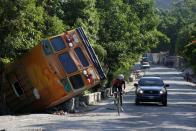 The Wider Image: Haiti's cyclists brave protests and poor roads in race for gold