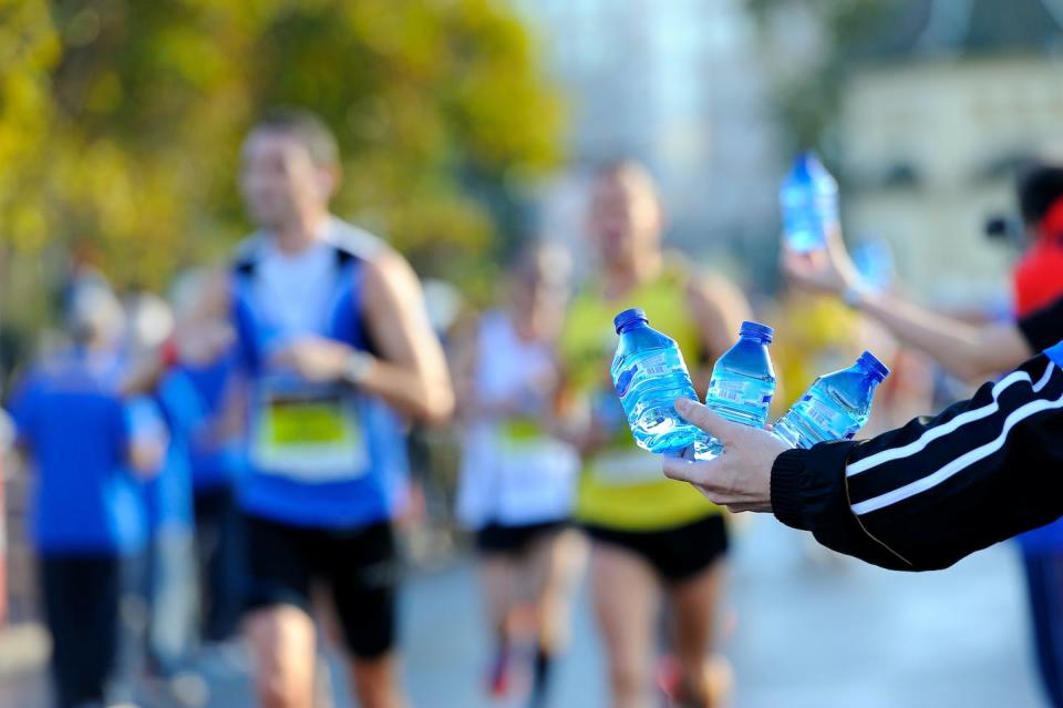 Runners can train for heat, wear appropriate clothing and hydrate, but these steps may not be sufficient to overcome the effects of heat. (Shutterstock)