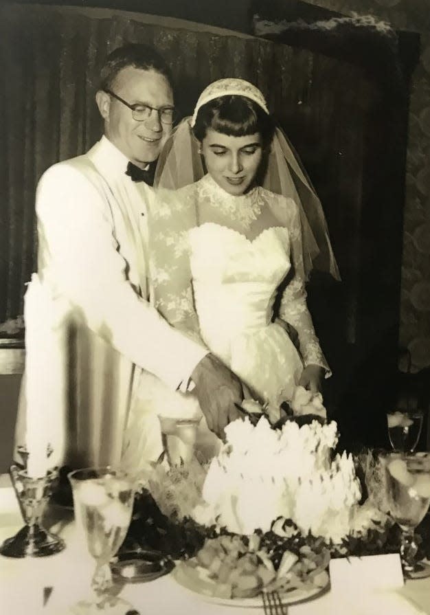 Art and Judy Oakford at their wedding reception in 1954.
