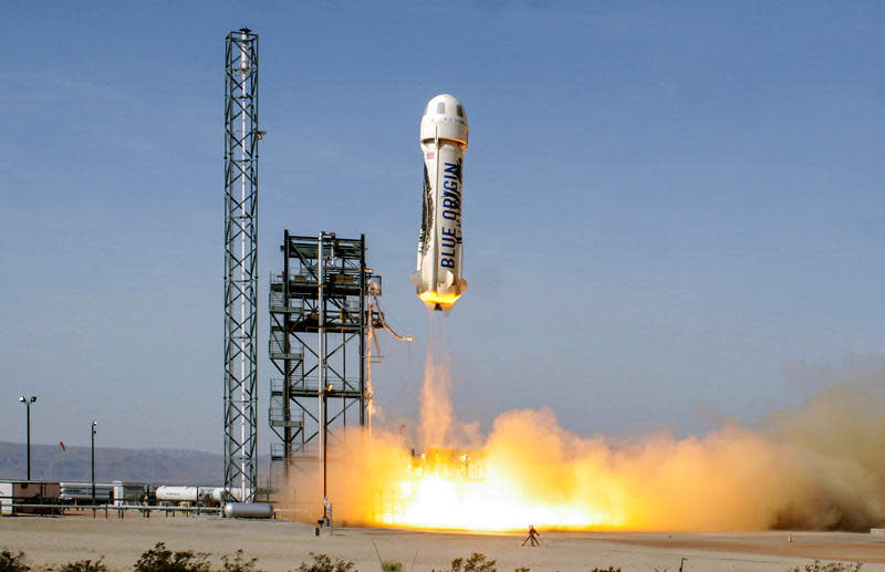 A Blue Origin New Shepard spacecraft blasts off from the company's west Texas test facility. Amazon founder Jeff Bezos, owner of Blue Origin, plans to blast off July 20 on the spacecraft's first piloted flight. / Credit: Blue Origin