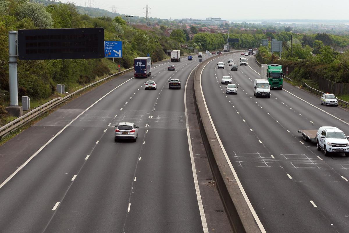 Vehicle rolls over in three-car crash in Sutton