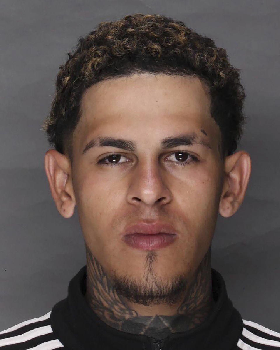 This image provided by the Lebanon County District Attorney's Office shows Alex Torres-Santos, charged with three counts of criminal homicide. Santos was involved in the fatal shooting of three people, including two children who’d been playing with kittens in the back yard of their Pennsylvania home. (Lebanon County District Attorney's Office via AP)