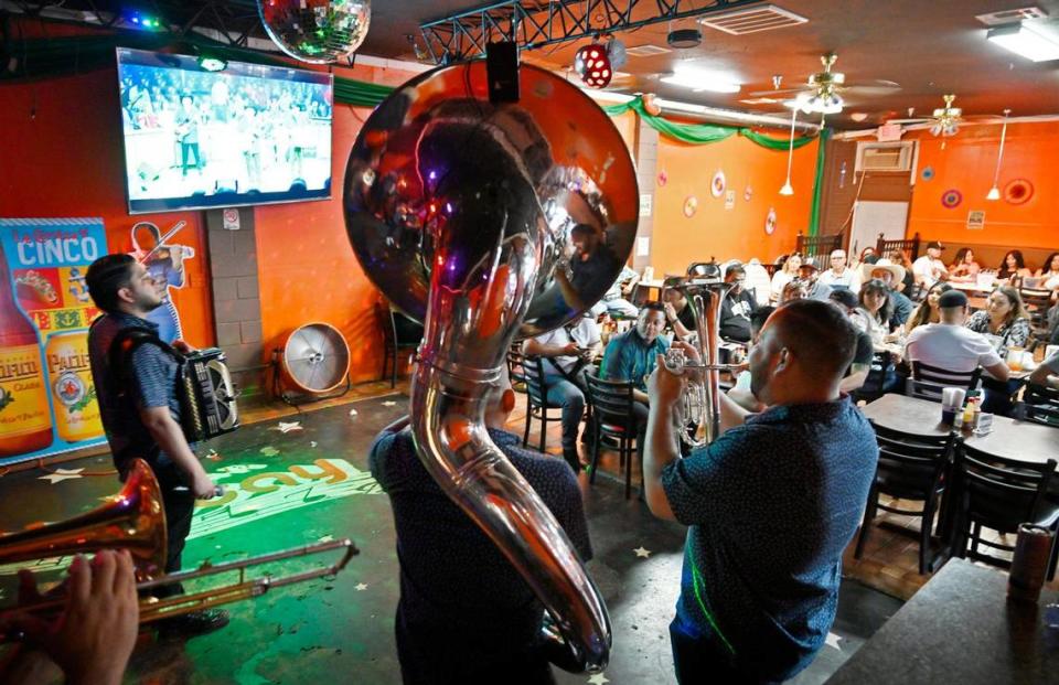 Banda Sinaloense Pura Cajeta plays to customers at El Godinazo Fresno Centro Botanero, located on Belmont in central Fresno Friday, June 23, 2023. ERIC PAUL ZAMORA/ezamora@fresnobee.com