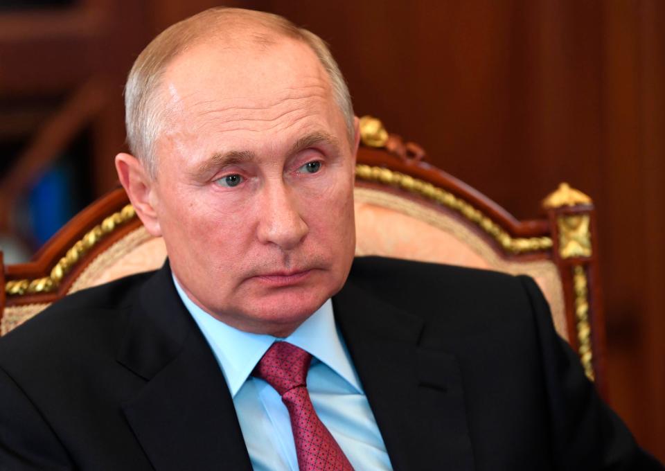 Russian President Vladimir Putin attends a meeting in the Kremlin in Moscow, Russia, Monday, Aug. 10, 2020.