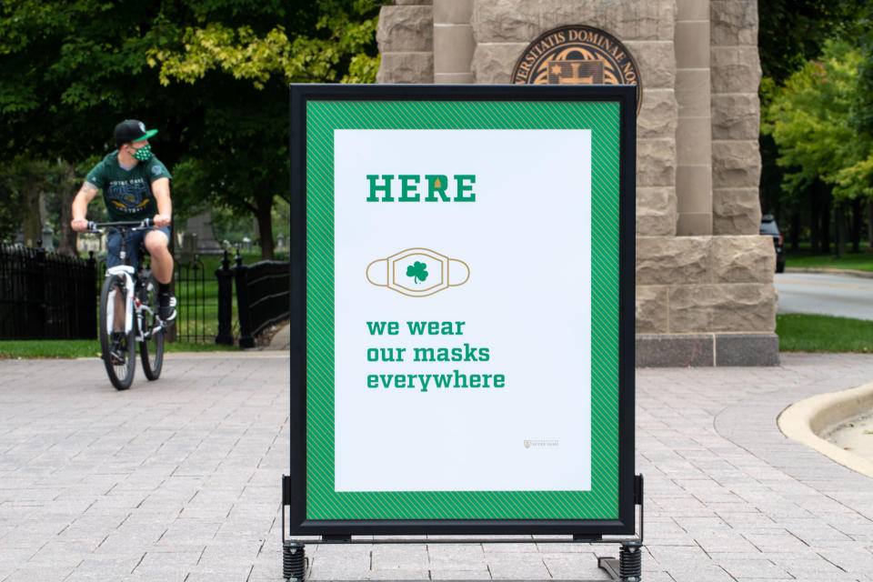 Sep 12, 2020; Notre Dame, Indiana, USA; A sign at the campus entrance to the University of Notre Dame reminds students, staff and visitors of the mandatory mask policy on campus before the football game between the Notre Dame Fighting Irish and the Duke Blue Devils at Notre Dame Stadium. Mandatory Credit: Matt Cashore-USA TODAY Sports